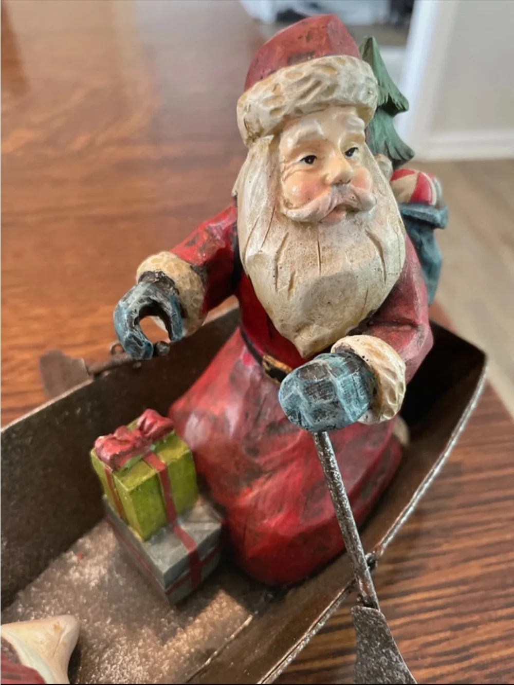 Santa and Snowman in metal fishing boat